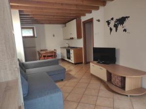 Grazioso appartamento con giardino e posto auto