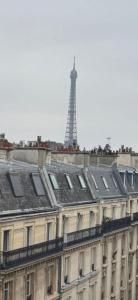 Luxe sous les toits de Paris avec vue Tour Eiffel