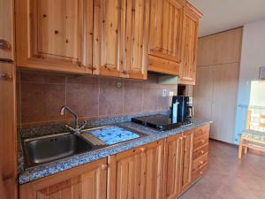 Casa Giardina-bilocale con deposito biciclette-sci