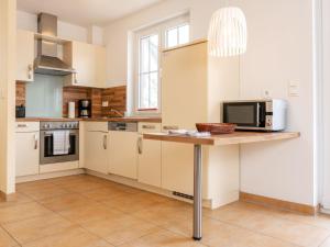 Holiday Home Ferien im Reethaus Möwe by Interhome