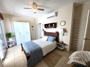 Sunny 2BR Condo with Pool Steps to Town & Beach