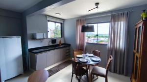 Apto novo de 2 quartos no centro da ilha