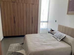 Stylish Brand New Condo Steps to Beach & Malecón