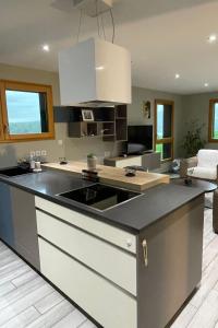 Apartment Das ruhige Les Grangettes mit Seeblick by Interhome