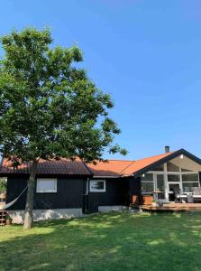 Family House In Two Homes At Fyns Head