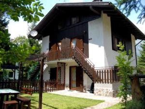 Apartment Erdgeschosswohnung mit möbliertem Garten by Interhome