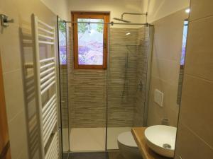 Apartment Erdgeschosswohnung mit möbliertem Garten by Interhome