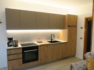 Apartment Erdgeschosswohnung mit möbliertem Garten by Interhome