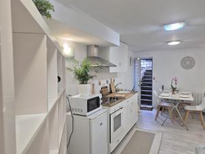 Light Spacious Basement Studio recently decorated in hosts house with private terrace and BBQ Ideal for The camino