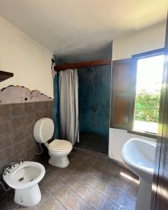 Casa rústica y departamento con wifi, cochera y asador a metros del río Mina Clavero