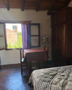 Casa rústica y departamento con wifi, cochera y asador a metros del río Mina Clavero