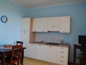 Apartment Zweizimmerwohnung 1 mit Terrasse- Gemeinschaftspool by Interhome