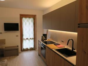 Apartment Erdgeschosswohnung mit möbliertem Garten by Interhome