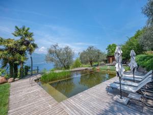 Holiday Home Villa mit schönem Seepanorama und Naturteich by Interhome