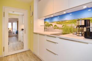 Sylter Welle, Whg 62, Landseite