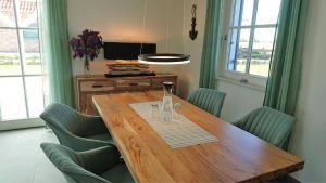 Reethaus Captains Hus - mit Seeblick