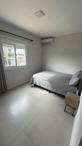 Casa com piscina em Capão da canoa