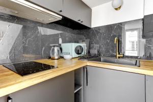 Studio lumineux au centre de Paris