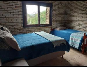 CASA, PRAIA DA FERRUGEM, 2 quart, ar-cond, Wi-Fi, PERTO DA PRAIA, 1 BANH, 1 LAVABO,GAROPABA ,SC