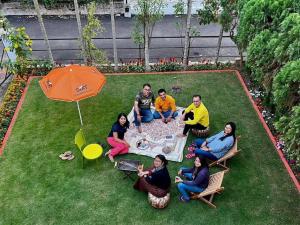 Shantiniketan Bungalow with green lawn