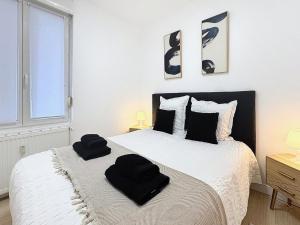 Le 24 appart rez-de-chaussée hyper-centre avec place de parking