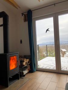 Házikó a Domboldalon