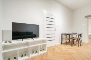 Modern City Apartment with Balcony by Rentez