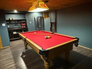 Bragg Creek Vacation Estate with hot tub, sauna, pool table, karaoke, private pond and forest trails