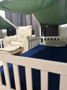 Apê à beira-mar aconchegante com sacada gourmet