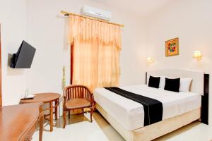 Hotel O near Mandala Krida Stadium formerly Among Rogo Family Hotel