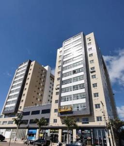 Praia e piscina - 5 min do centro de Torres