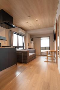 AURA YUZAWA Apartment Hotel - 1Bedroom Apartment with Living Dining Kitchen Sleeps 2 to 4, Bedroom with 2-Double Bed, Living Room with 1-Sofa Bed