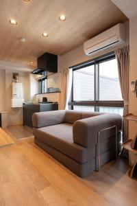 AURA YUZAWA Apartment Hotel - 1Bedroom Apartment with Living Dining Kitchen Sleeps 2 to 4, Bedroom with 2-Double Bed, Living Room with 1-Sofa Bed