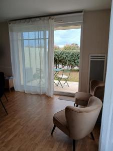 Studio front de mer, jardin, parking