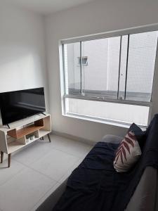 Apartamento espaçoso a poucos passos do mar