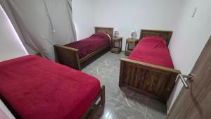 Depto en planta baja con Aire acondicionado a 500m de la ruta - Camas individuales