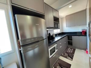 Apartamento aconchegante com vista para o mar