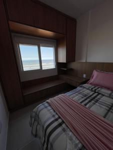 Apartamento aconchegante com vista para o mar