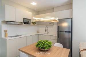 Sua estadia exclusiva a poucos passos do Mar em Meia Praia - FFS