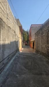 Casa Azteca - 2 Hab para 2 per en casa compartida enfrente del Estadio Azteca