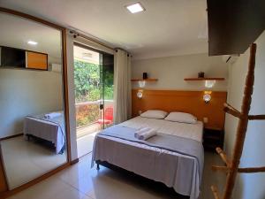 Apto c varanda a passos do mar em Ilheus ERW0301