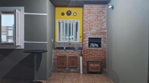 Casa com pátio grande - Capão Novo