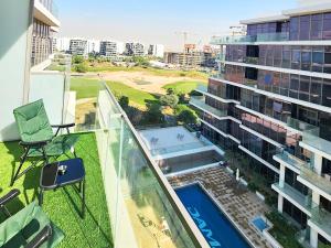 Spacious Golf & Pool View Home with Huge Balcony