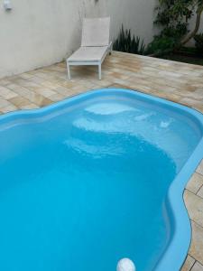 Casa Imbé com piscina 4 quartos