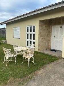 Casa Imbé com piscina 4 quartos