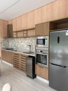 Novíssimo apartamento em São Lourenço ao lado da Riviera de São Lourenço, Bertioga