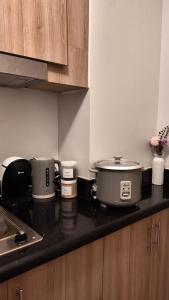 Staycation near NAIA, MOA with PS4, Netflix & Karaoke