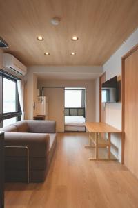 AURA YUZAWA Apartment Hotel - 1Bedroom Apartment with Living Dining Kitchen Sleeps 2 to 4, Bedroom with 2-Double Bed, Living Room with 1-Sofa Bed