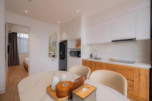 Mia Apartments by XÔI Residences