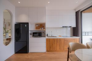 Mia Apartments by XÔI Residences